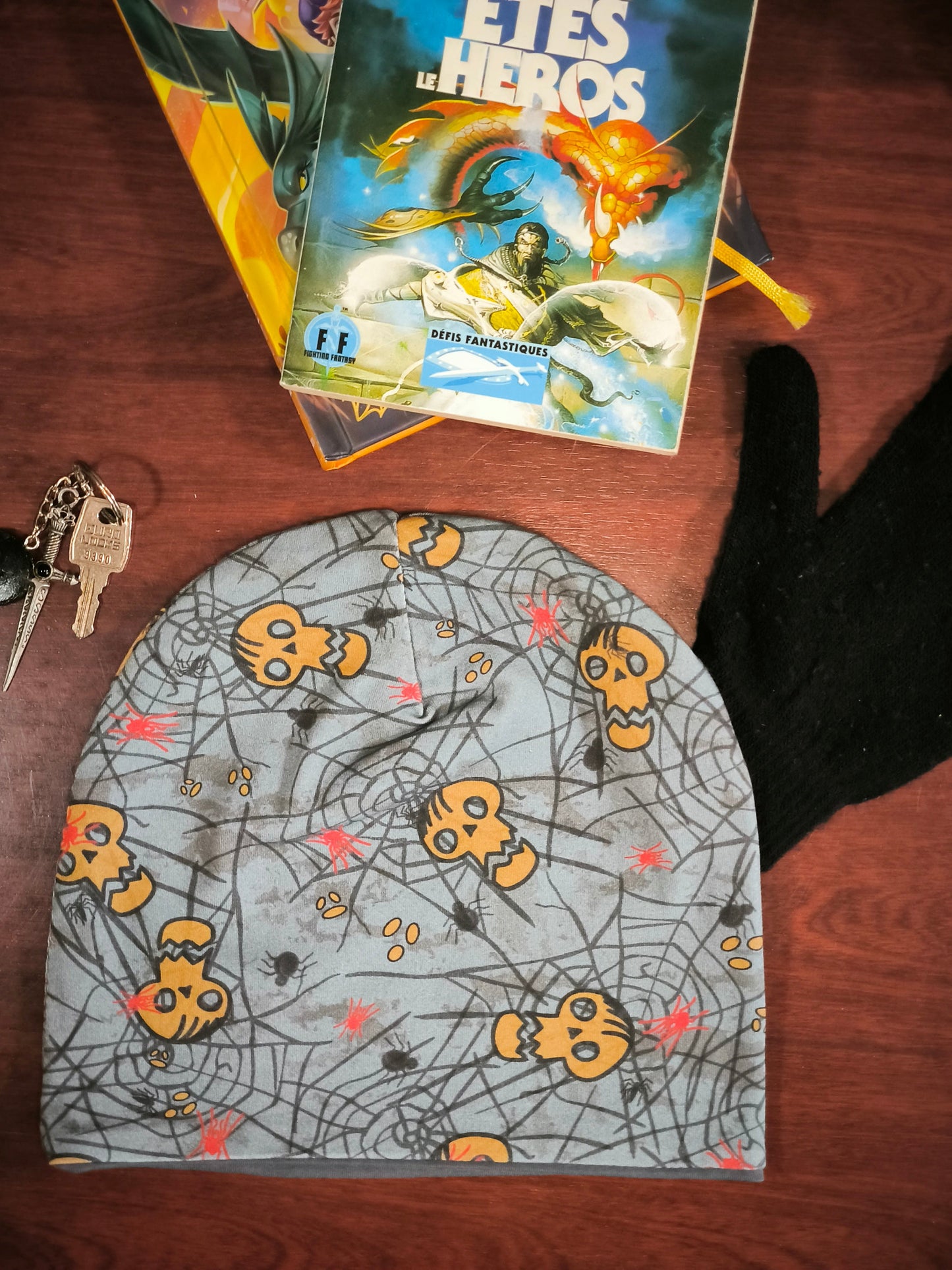 Bonnet réversible têtes de mort en gris *enfant*