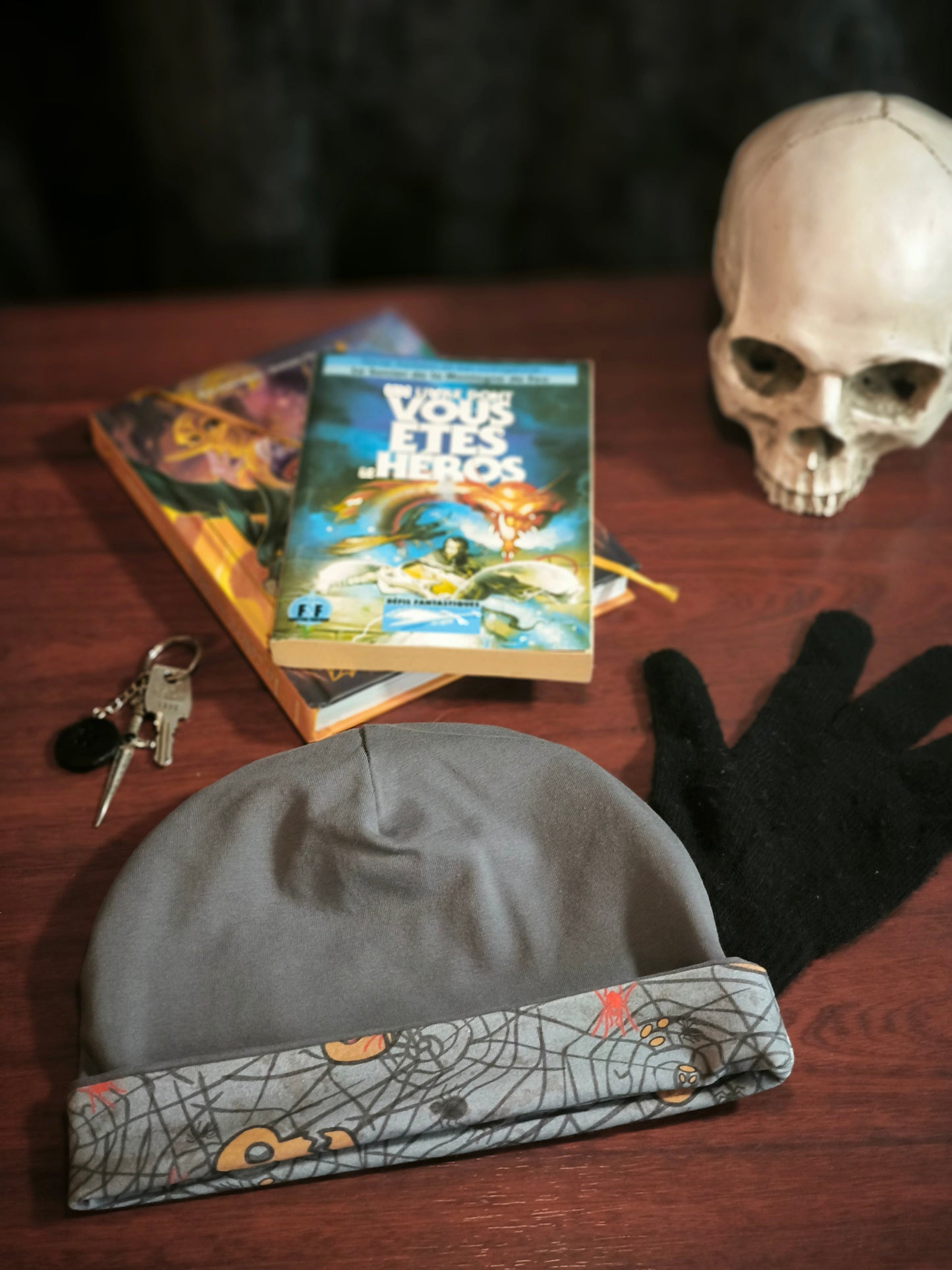 Bonnet réversible têtes de mort en gris *enfant*