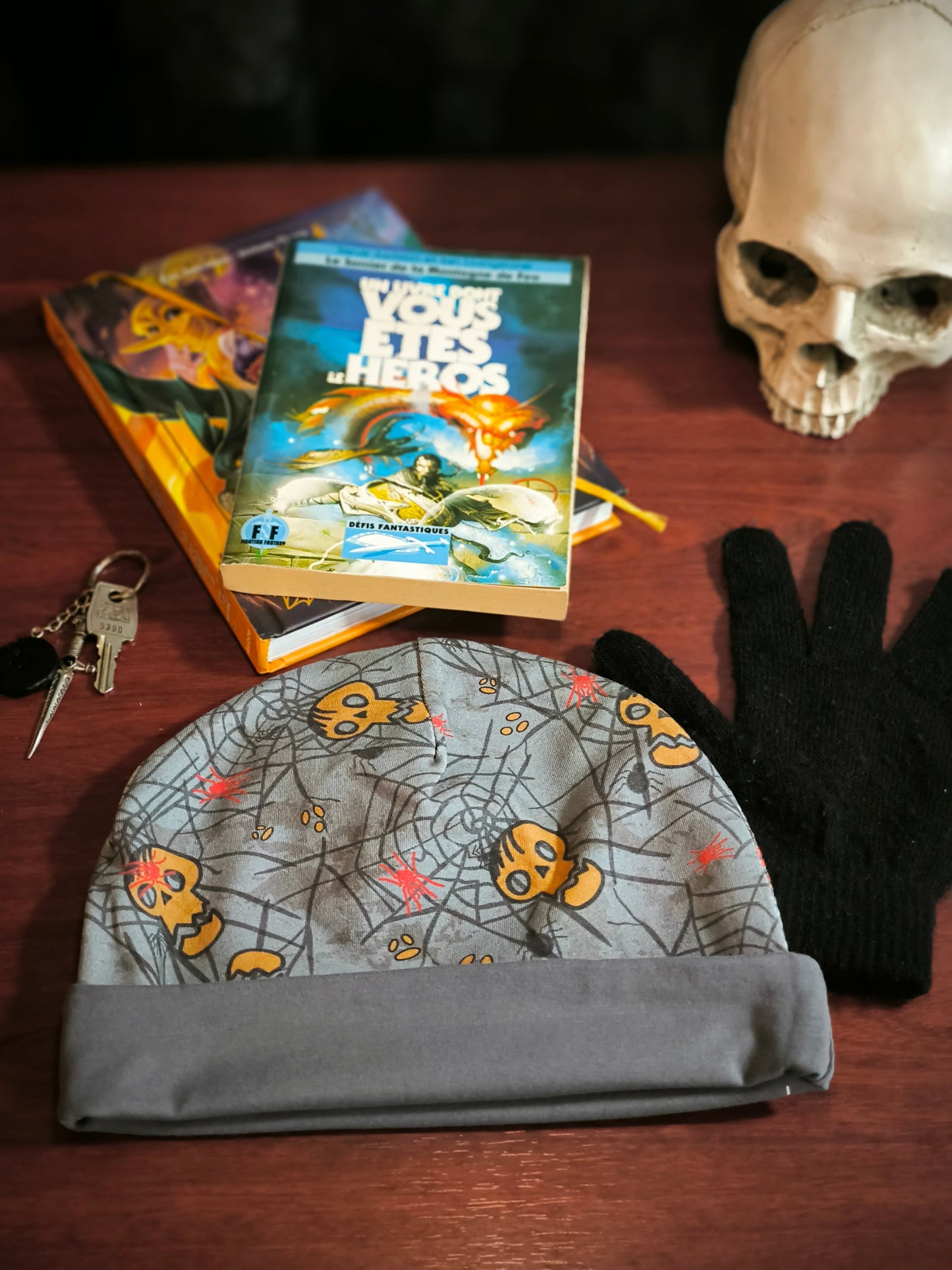 Bonnet réversible têtes de mort en gris *enfant*