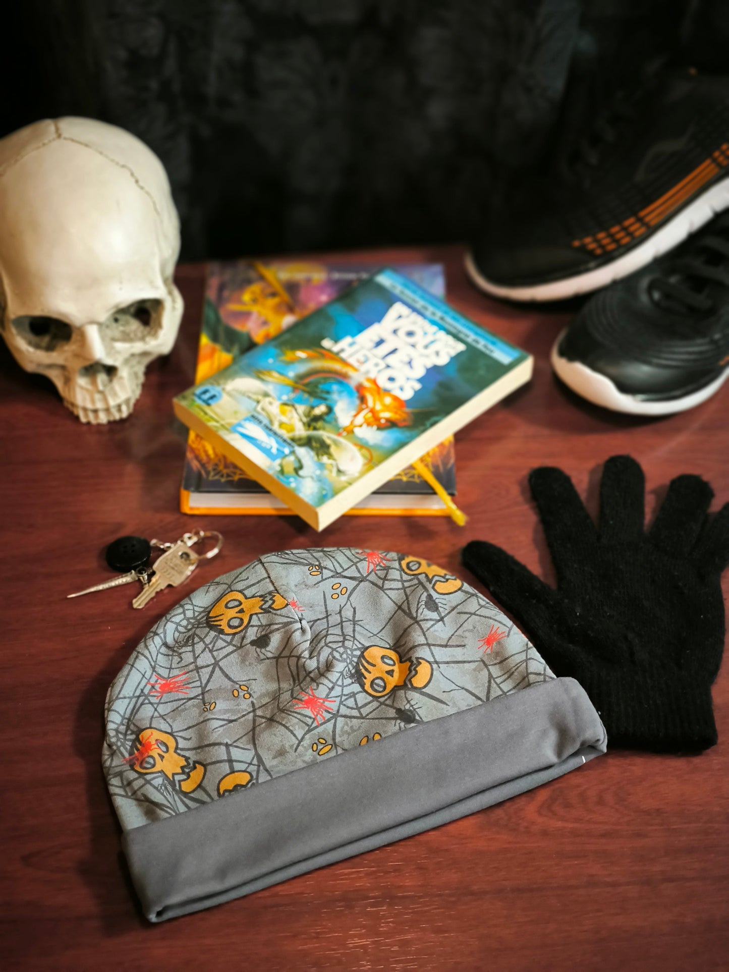 Bonnet réversible têtes de mort en gris *enfant*