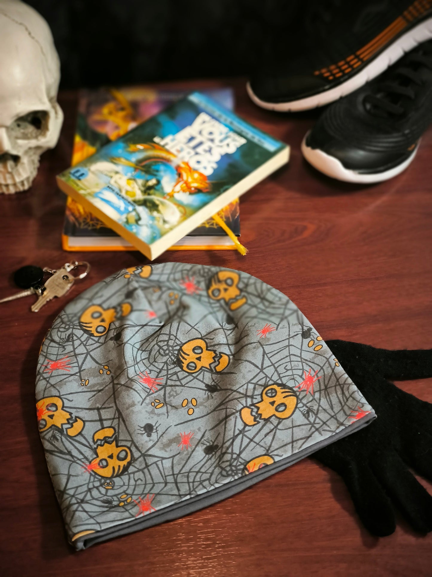 Bonnet réversible têtes de mort en gris *enfant*