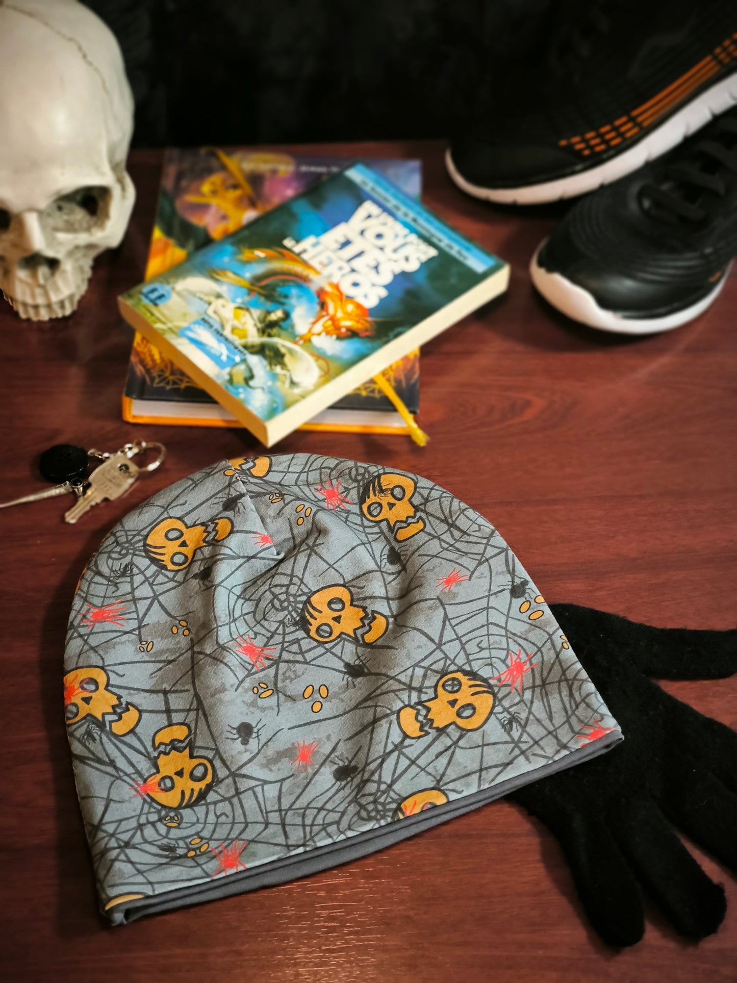 Bonnet réversible têtes de mort en gris *enfant*
