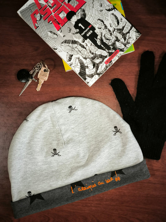 Bonnet réversible en jersey Têtes de mort et étoiles *adulte*
